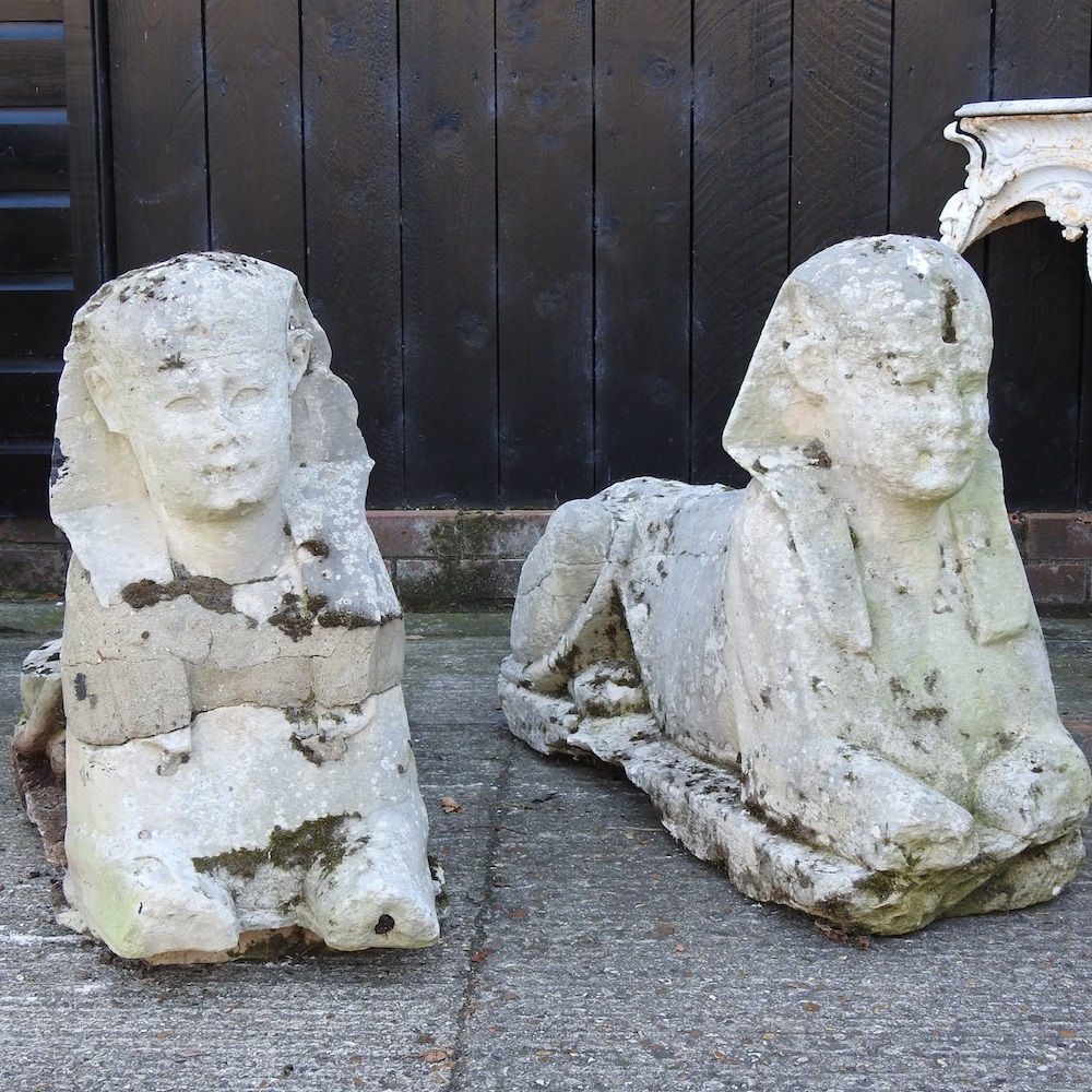 Two sphinx statues that sold for $266,000 this month. Courtesy of Mander Auctioneers.