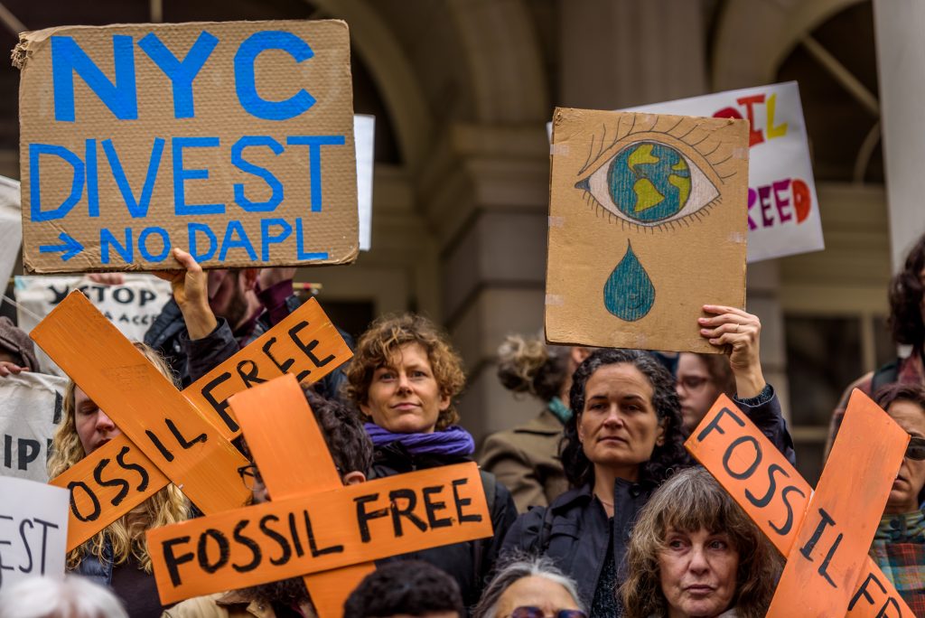 Leaders from the Ramapough Lenape Nation, NYC American Indian Community House, American Indian Law Alliance, and other allies protesting at City Hall to demand the city's business, contracts, and pension fund divest from banks funding the Dakota Access pipeline in April 2017. (Photo by Erik McGregor/LightRocket via Getty Images)