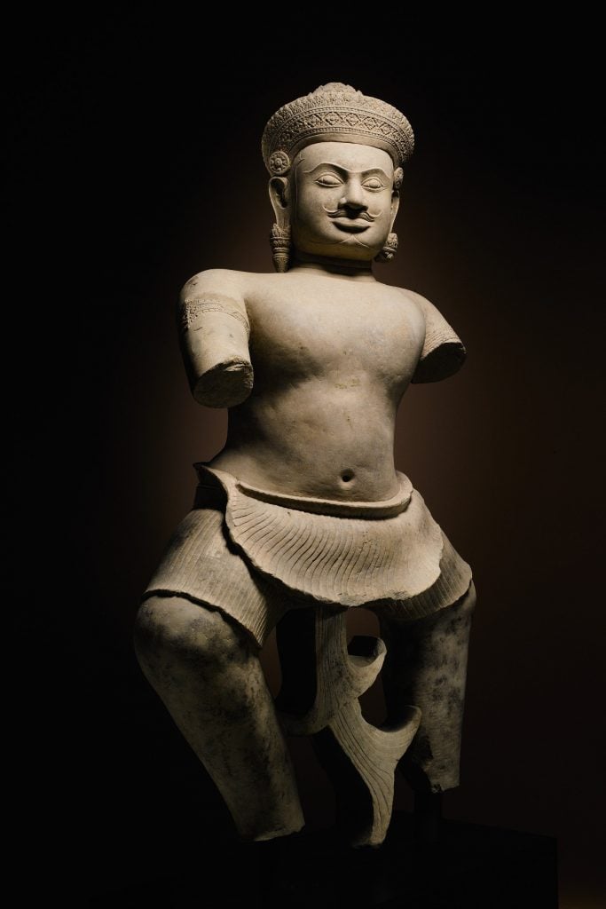 Douglas Latchford's ties to looted artworks were first discovered with the attempted sale of this 10th-century Khmer statue at Sotheby's in 2011. Photo courtesy of Sotheby's.