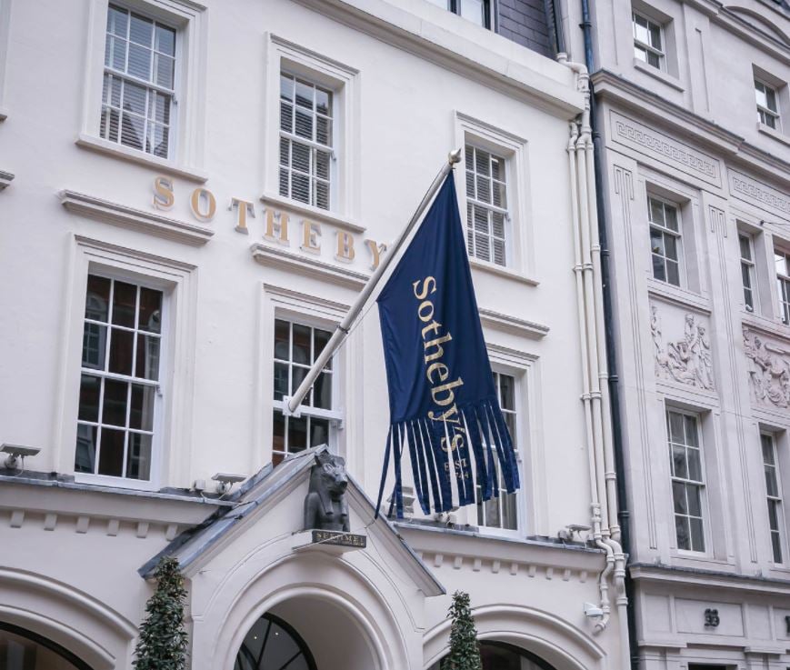 Sotheby's dressed up the flag outside its London HQ in honor of Banksy. Photo courtesy of Sotheby's © Bizzy Arnott