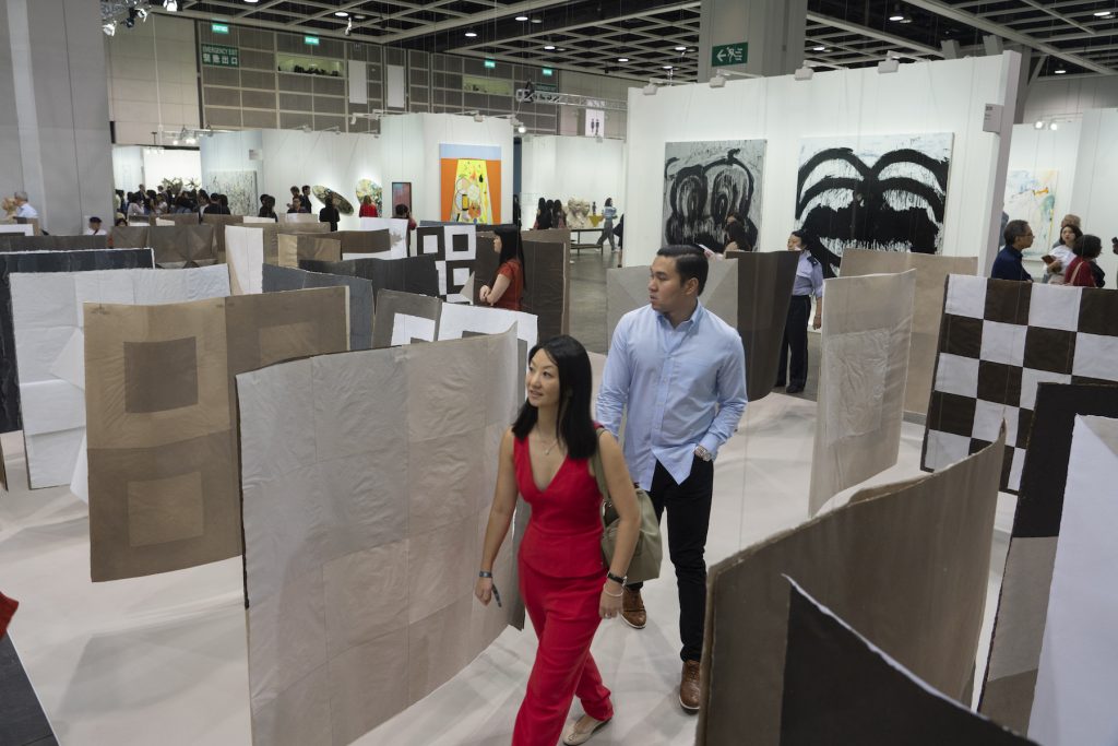 Visitors walk through an art installation at Art Basel on March 28, 2019 in Hong Kong, Hong Kong. (Photo by Theodore Kaye/Getty Images for Hong Kong Tourism Board)