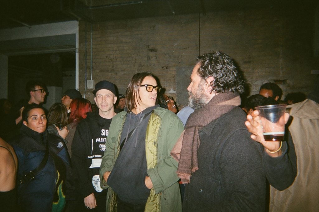 Alastair Mckimm, Mario Sorrenti, and Gavin Brown at the debut of Arthur Jafa's latest film. Photo: Annie Armstrong. 