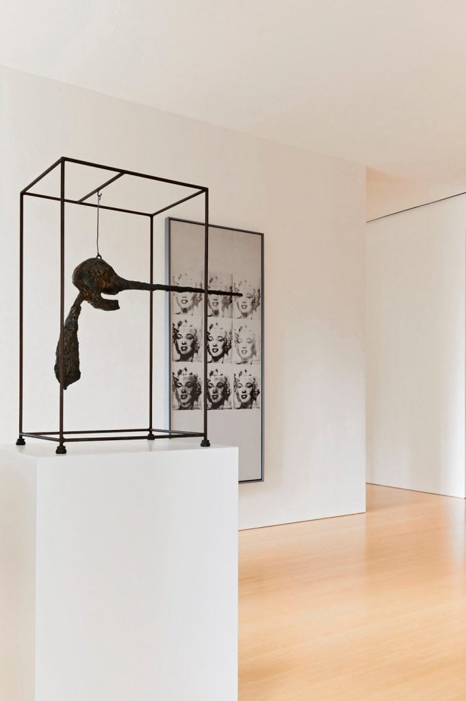 Giacometti's Le Nez and Warhol's Nine Marilyns. Courtesy of Sotheby's.
