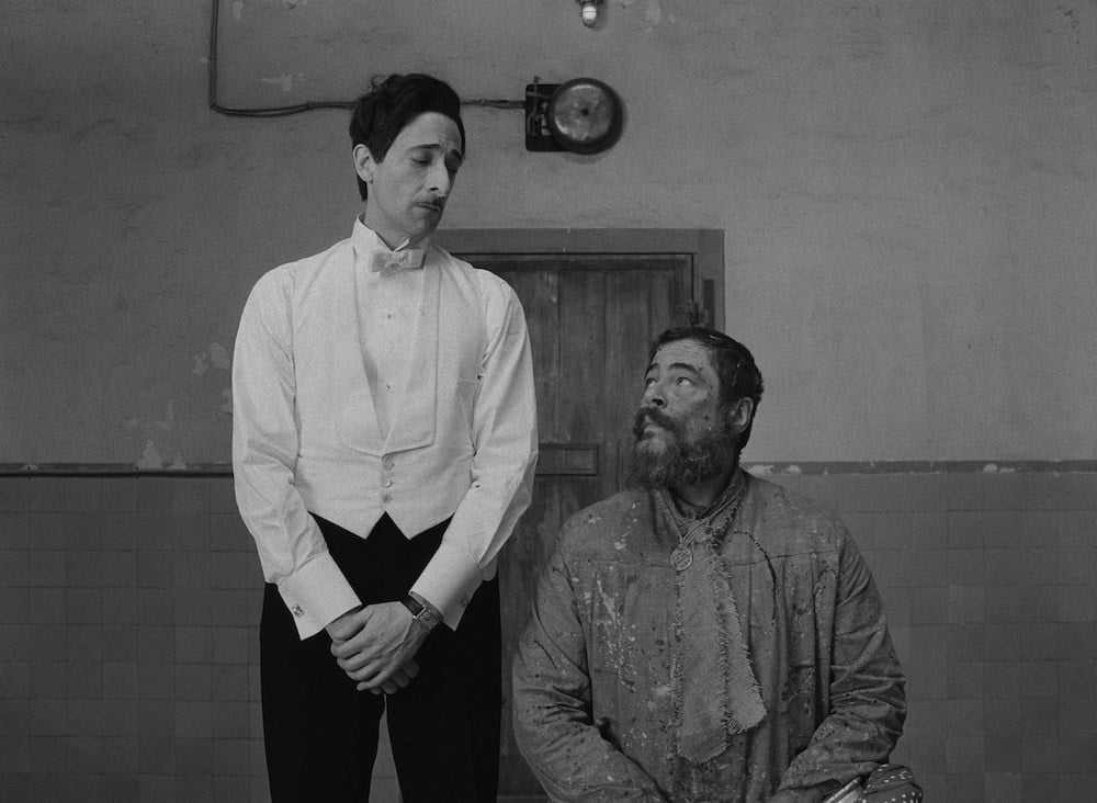 Adrien Brody as Julian Cadazio and Benicio Del Toro as Moses Rosenthaler in <em>The French Dispatch</em>. Photo courtesy of Fox Searchlight Pictures.