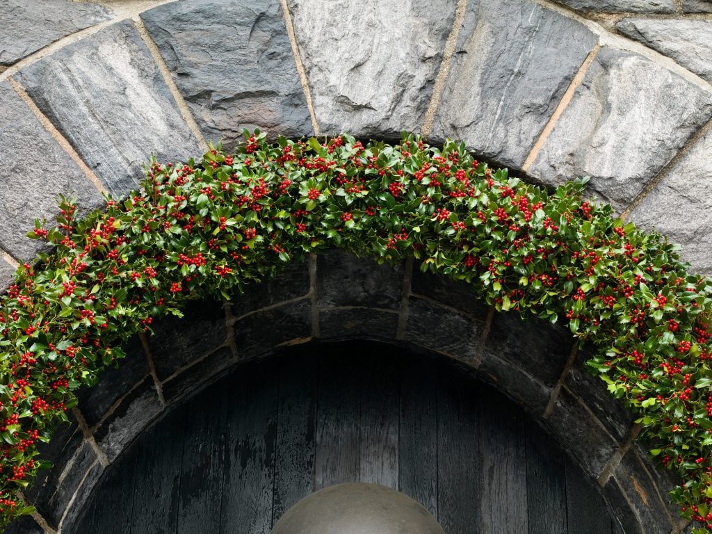 A holly arch during the 2013 holiday display at the Met Cloisters. Photo courtesy the Metropolitan Museum of Art.