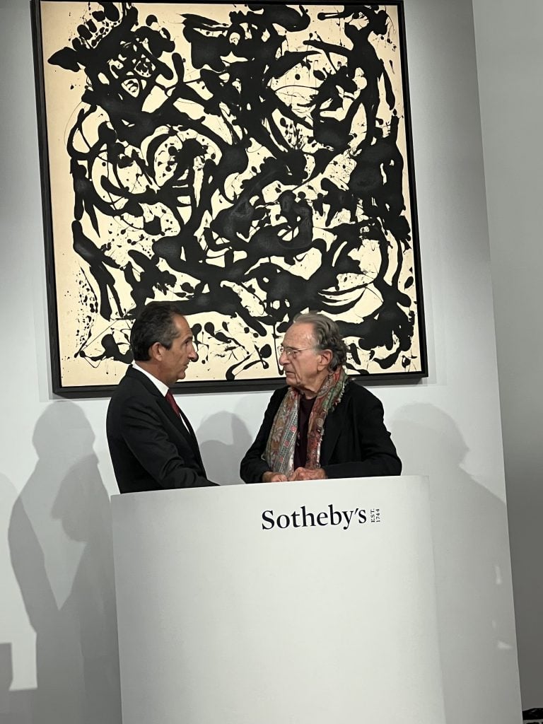Sotheby's billionaire owner Patrick Drahi and Harry Macklowe at the sale, standing in front of Jackson Pollock's <i>Number 17, 1951</i>. Photo: Katya Kazakina