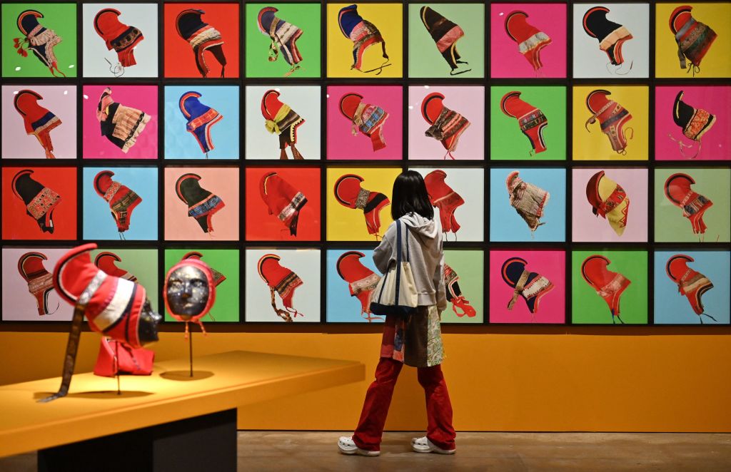 A visitor looking at the art installation "Outi Pieski" by Eeva-Kristiina Harlin during a preview of the 13th Gwangju Biennale on March 31, 2021. Photo: Jung Yeon-je / AFP via Getty Images.