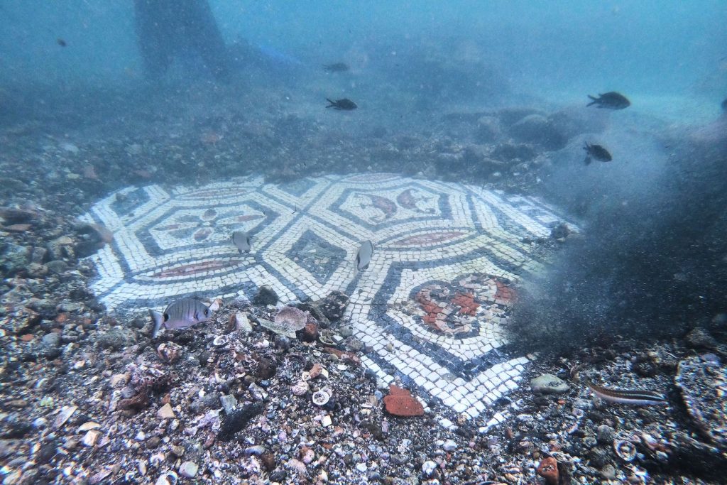 A mosaic from Terme del Lacus in the submerged ancient Roman city of Baia at the Underwater Archaeological Park of Baia, part of the Campi Flegrei Archaeological Park complex site in Pozzuoli near Naples. Photo by Andreas Solaro/AFP via Getty Images.