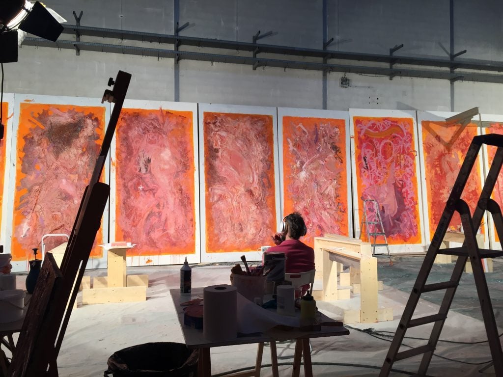 Sandro Kopp working on the artwork for <em>The French Dispatch</em>. Photo courtesy of Sian Smith. 