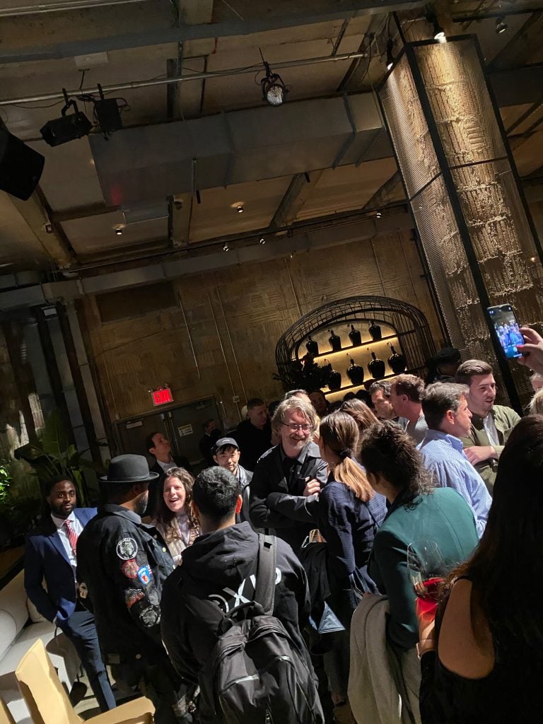 Artist and NFT co-inventor Kevin McCoy in the scrum at an NFT.NYC satellite event for his crypto platform, Monegraph, at NeueHouse Madison Square in New York in November 2021. Photo by Tim Schneider.