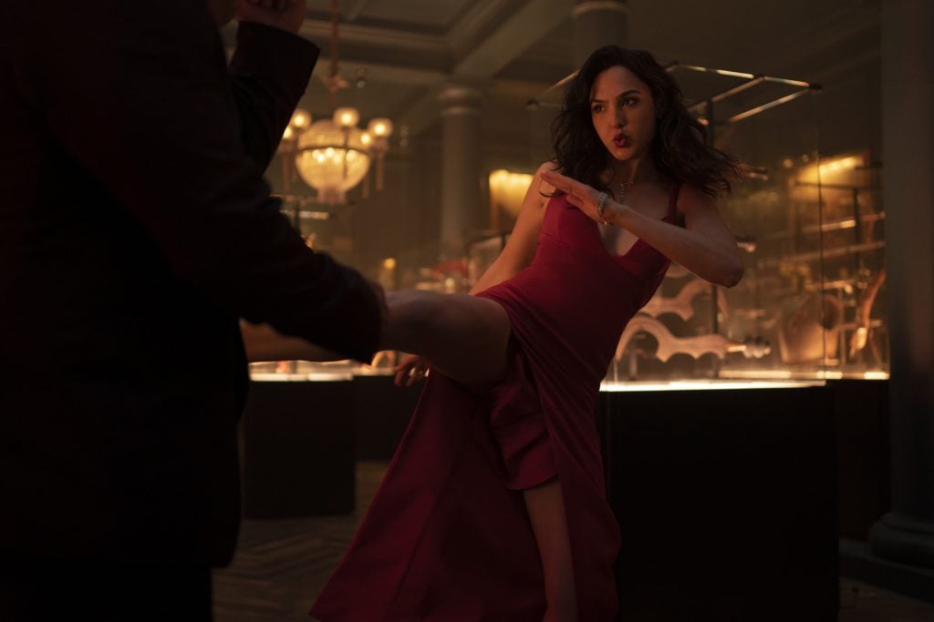 Gal Gadot is the world’s most wanted art thief “The Bishop” in Netflix's <em>Red Notice</em>. Photo by Frank Masi, courtesy of Netflix ©2021.