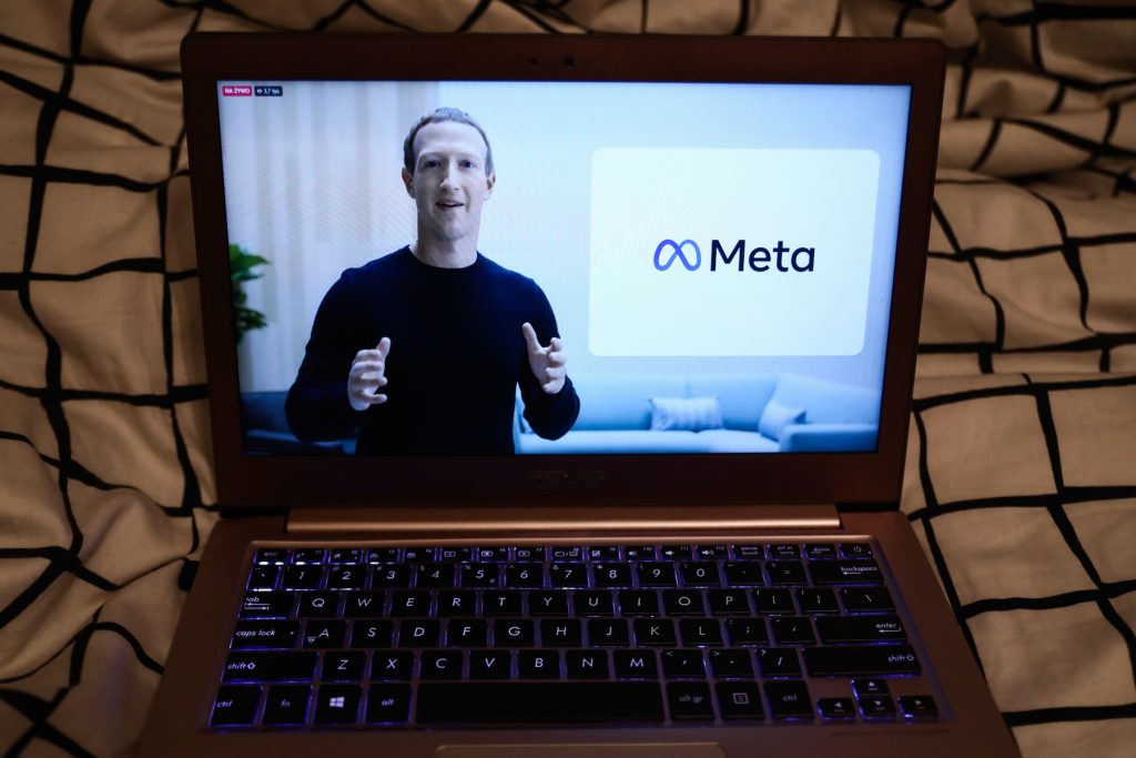 Mark Zuckerberg announcing the new name of the company and Meta logo are seen during Facebook Connect livestream displayed on a laptop screen in this illustration photo taken in Krakow, Poland on October 28, 2021. (Photo by Jakub Porzycki/NurPhoto via Getty Images)
