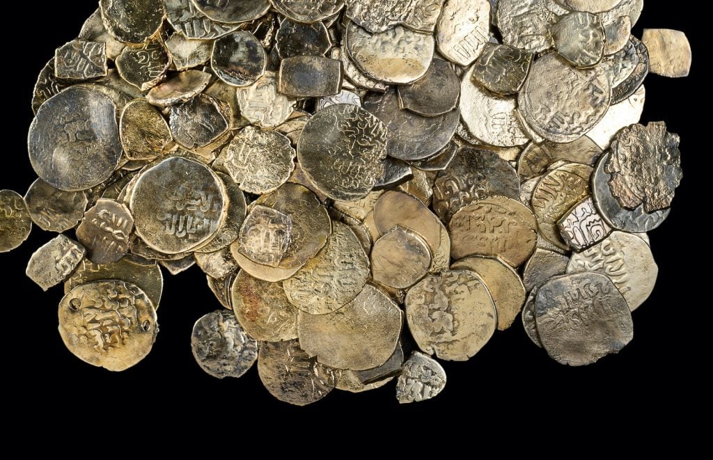 Hoard of coins from the Mamluk period including cut coins. Photo: Dafna Gazit, Israel Antiquities Authority