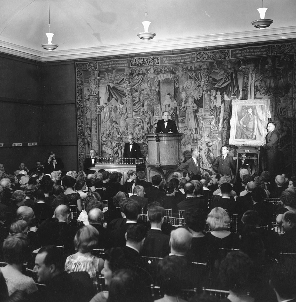 16th October 1958: Bidders and auctioneers at a Sotheby's auction of New York millionaire Jacob Goldschmidt's collection of impressionist paintings. Photo by Keystone/Getty Images.