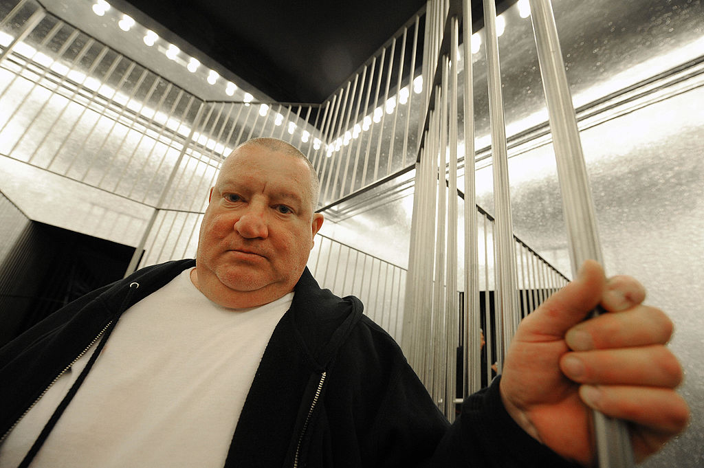 French artist Claude Leveque poses inside his installation, Le grand soir at the French pavilion of the Venice Biennale in 2009. Photo by Alberto Pizzoli/AFP via Getty Images.