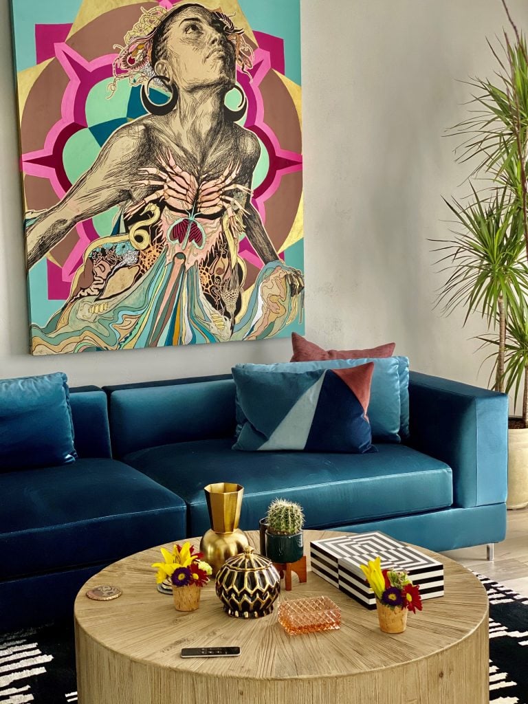 Mashonda Tifrere's living room features a piece by Swoon. Photo courtesy of Mashonda Tifrere.
