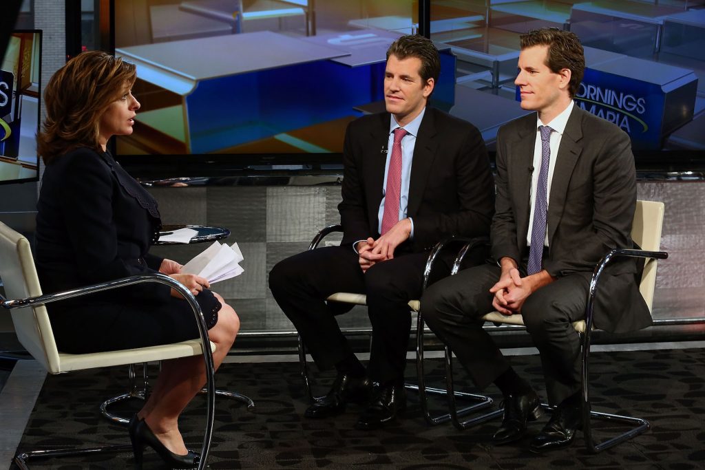 Entrepreneurs Cameron Winklevoss and Tyler Winklevoss discuss, investors in Nifty Gateway, appear at FOX Studios on December 11, 2017 in New York City. (Photo by Astrid Stawiarz/Getty Images)