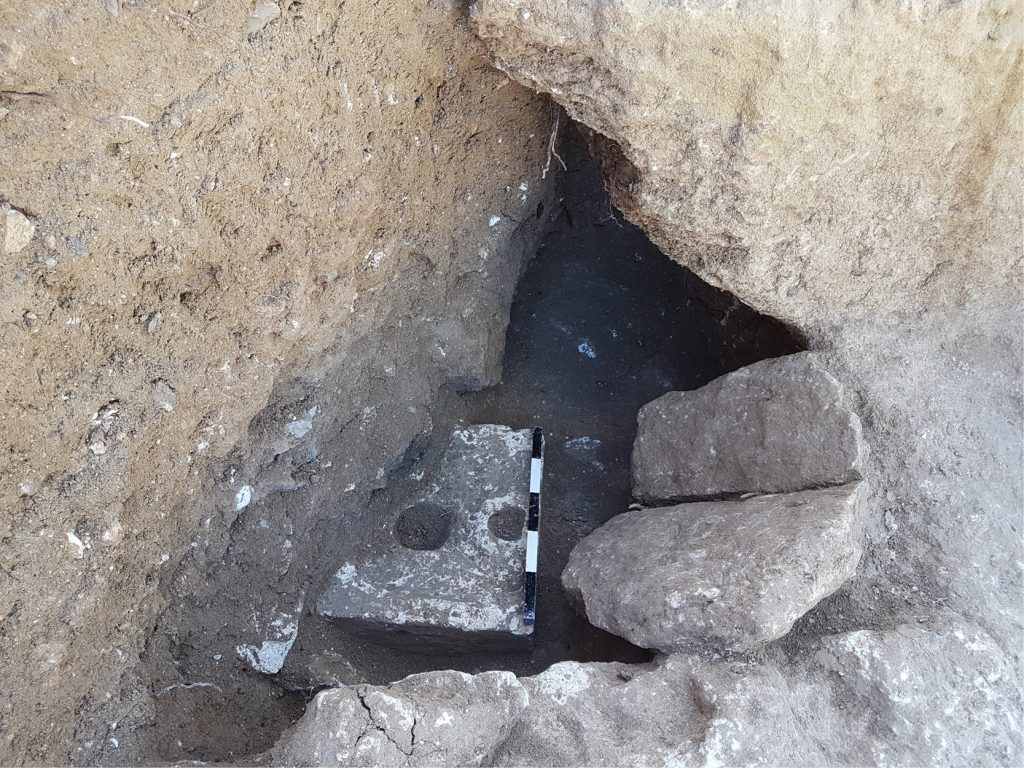 The stone toilet seat found during the 2019 excavation at Armon Hanatziv. Photo by Ya’akov Billig.