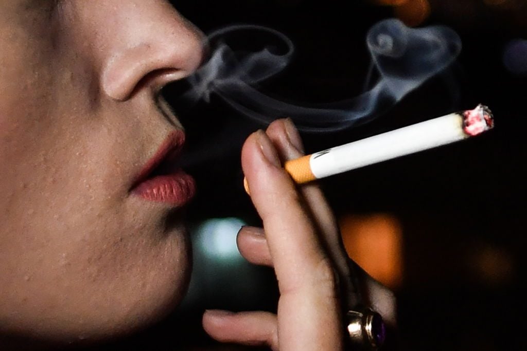 Paging David Hockney! Smoking is... in? It's still bad for you, though. (Photo by Kirill KukhmarTASS via Getty Images)