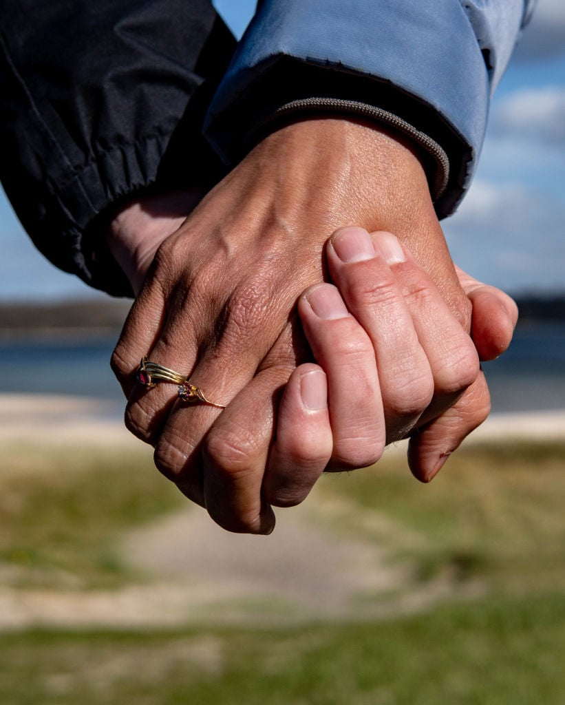 Ahhhh, looooove... Also, FYI, these are not Lucas Zwirner's hands. (Photo by Axel Heimken/picture alliance via Getty Images)