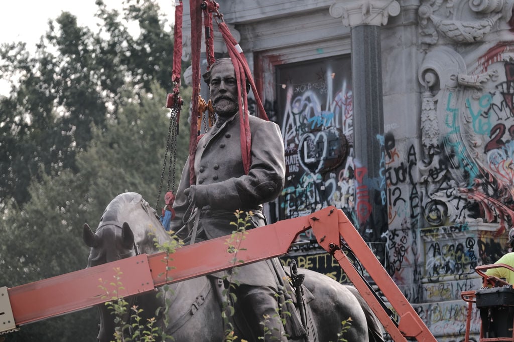 The statue of Robert E. Lee being removed in Virginia. (Photo by Eze Amos/Getty Images)