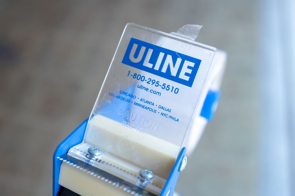 Close-up of logo for shipping and logistics supply company Uline. Photo: Smith Collection/Gado/Getty Images.