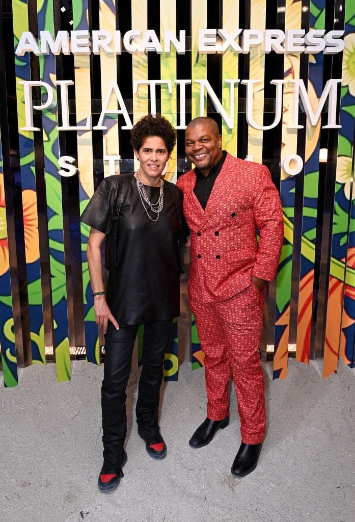 Julie Mehretu and Kehinde Wiley attend as American Express unveils New Art x Platinum Designs on December 01, 2021 in Miami Beach, Florida. Photo by Bryan Bedder/Getty Images for American Express.