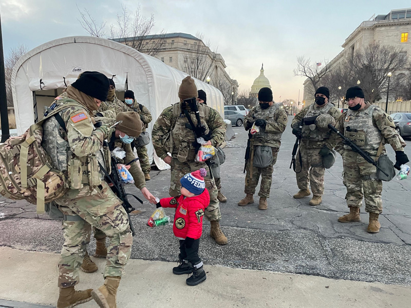 Noah Savoy meeting members of the National Guard protecting the Capitol. Photo courtesy of the Savoy family.