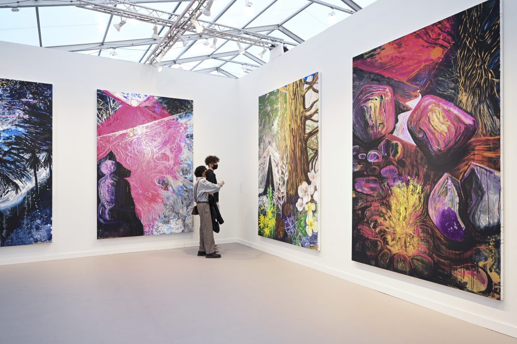 Thomas Houseago's paintings on view at Frieze Los Angeles 2022. Photo by Casey Kelbaugh. Courtesy of Casey Kelbaugh/Frieze.