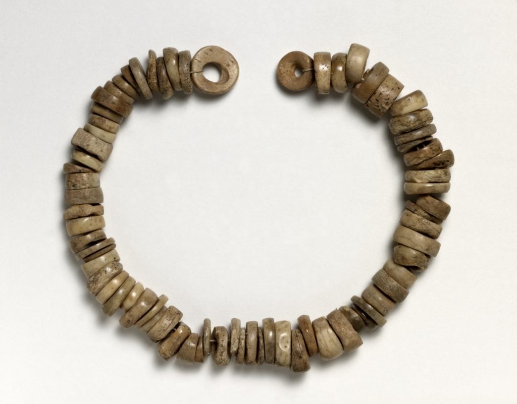 Bone-bead necklace (3100–2500 BC) part of the finds from Skara Brae, Orkney, Scotland. Photo ©the Trustees of the British Museum.