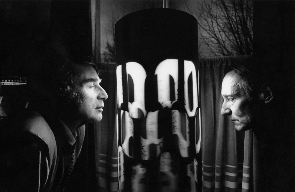 Bryon Gysin and his Dream Machine. William Burroughs is on the left. c. 1970 , London.
