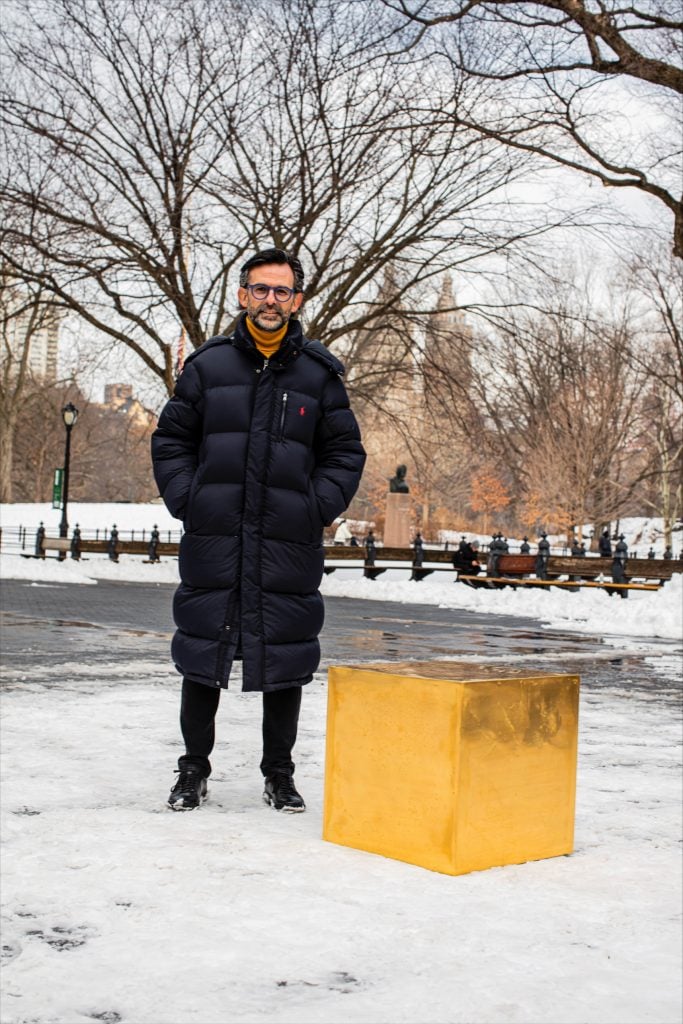 Niclas Castello with his piece <em>The Castello Cube</em> in Central Park, New York. Photo by Sandra Mika.