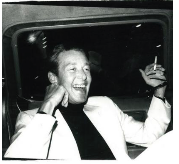 Andy Warhol, Halston in the backseat of a limo (en route to Studio 54 with Bianca Jagger) (1979). Courtesy Hedges Projects, Los Angeles. Copyright The Andy Warhol Foundation for the Visual Arts.