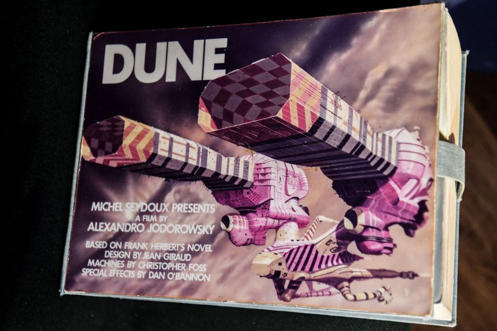One of the ten copies of Alejandro Jodorowsky's epic 1970 Dune storyboard, featuring illustrations by Moebius and H.R. Giger, on display at Christie's Paris, November 19, 2021. Photo: ALAIN JOCARD/AFP via Getty Images.