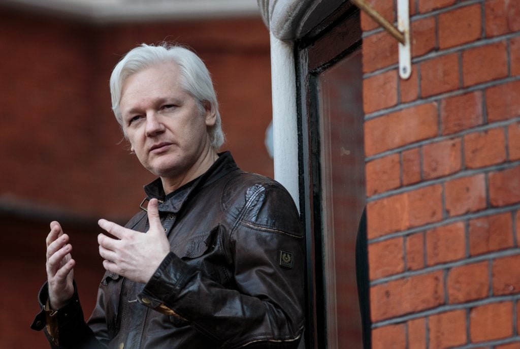 Wikileaks founder Julian Assange speaking to the media from the balcony of the Embassy of Ecuador in London in 2017. Photo by Jack Taylor/Getty Images.