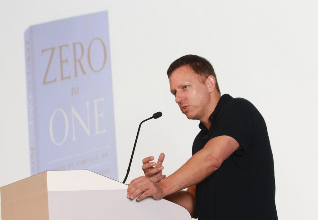 PayPal founder Peter Thiel attends a talk, 