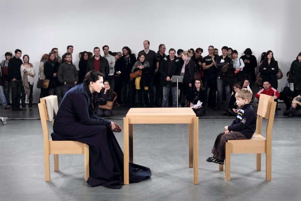 Installation view of Marina Abramović's performance <i>The Artist is Present</i> at the Museum of Modern Art in New York, 2010. Courtesy of Sean Kelly Gallery.