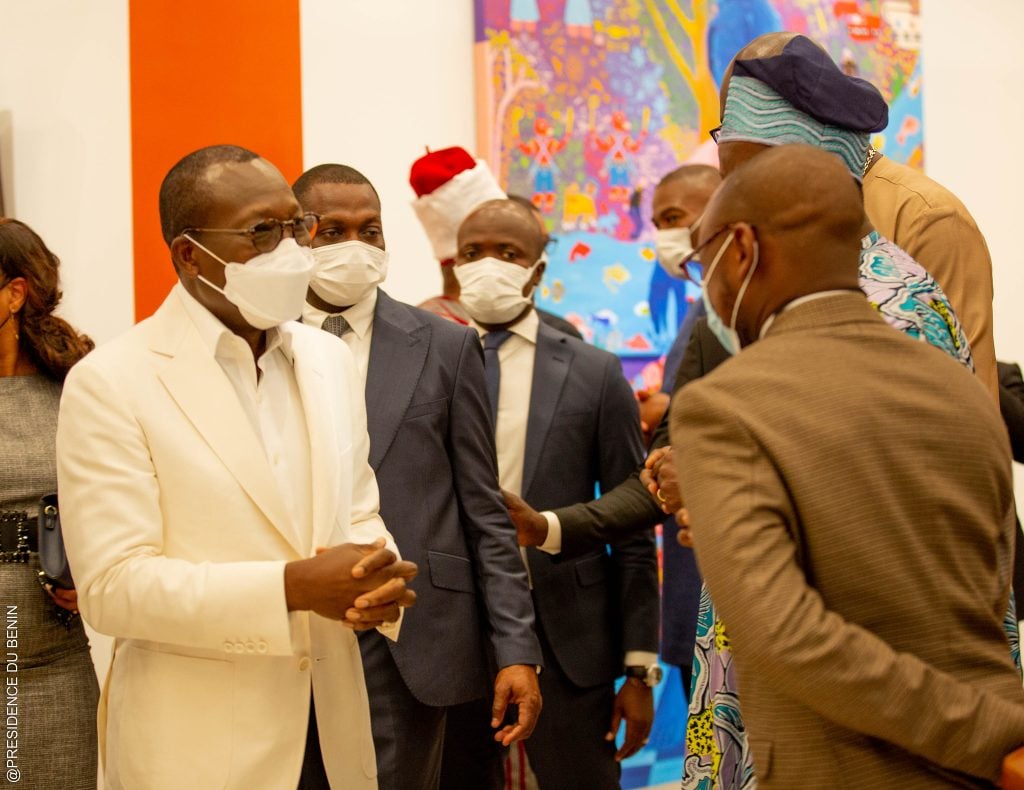 President of Benin Republic, Patrice Talon, engaging with guests at a private viewing. ©Presidence du Benin.