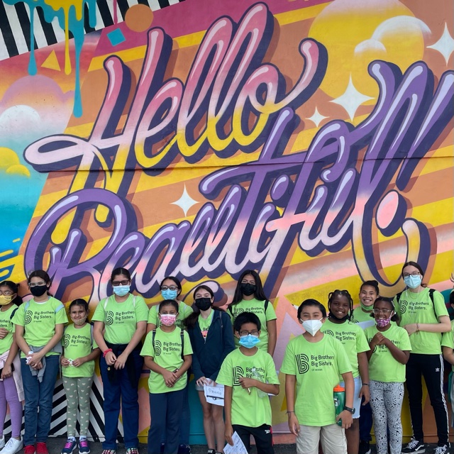 Comic Kids visit Hello Beautiful mural at by Andrea von Bujdoss aka “Queen Andrea” at Wynwood Walls.