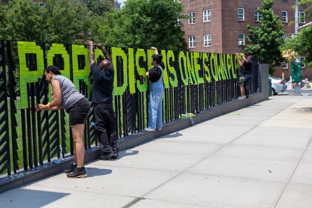 "The Song That I Sing is Part of An Echo" fence weaving led By Brooklyn Hi-Art! Machine, presented by A Blade of Grass in collaboration with Weeksville Heritage Center. Photo: Brittany Laurent.
