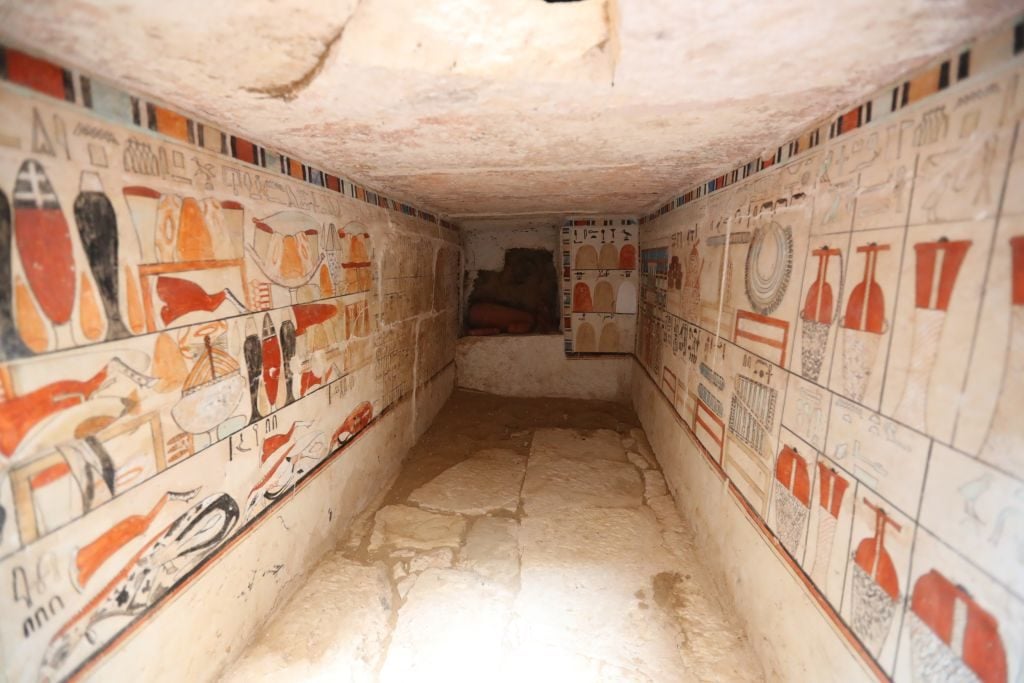 Mural paintings in an ancient tomb uncovered at Saqqara archaeological sites southwest of Cairo, Egypt, on March 19, 2022. Photo: Sui Xiankai/Xinhua via Getty Images.