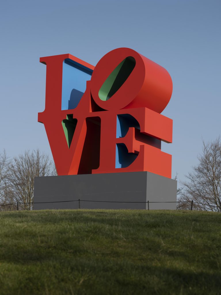 Robert Indiana, LOVE (Red Blue Green) (1966–1998). Installation view at Yorkshire Sculpture Park, 2022. Photo: © Jonty Wilde, courtesy of Yorkshire Sculpture Park. Artwork: © 2022 Morgan Art Foundation Ltd./ Artists Rights Society (ARS), New York/DACS, London