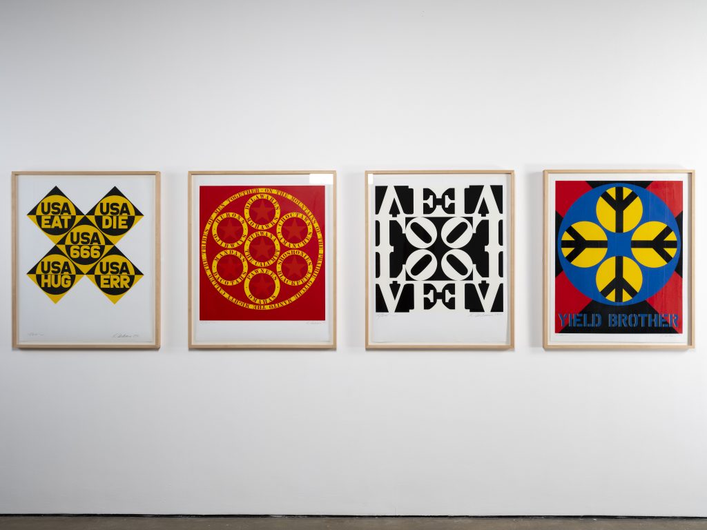Robert Indiana, USA 666 (1964-66); The Calumet (1961); Black and White LOVE (1969); Yield Brother (1963). Installation view at Yorkshire Sculpture Park, 2022. Photo: © Jonty Wilde, courtesy of Yorkshire Sculpture Park. Artwork: © 2022 Morgan Art Foundation Ltd./ Artists Rights Society (ARS), New York/DACS, London