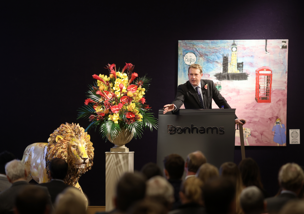 LONDON, ENGLAND - NOVEMBER 09: Auctioneer Sholto Gilbertson at the Tusk Lion Trail Auction 2021 at Bonhams on November 09, 2021 in London, England. (Photo by Chris Jackson/Getty Images for Tusk Trust)