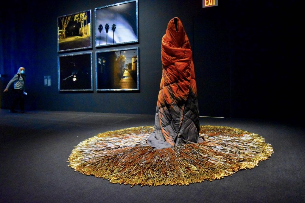 Works by Guadelupe Rosales and [foreground] Rebecca Belmore, <em>iskode (fire)</em> (2021). Photo by Ben Davis. 