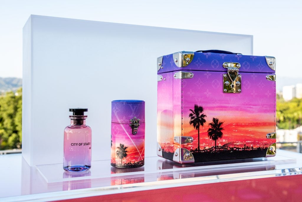 A City of Stars fragrance and its Alex Israel-designed accessories. Courtesy of Louis Vuitton.