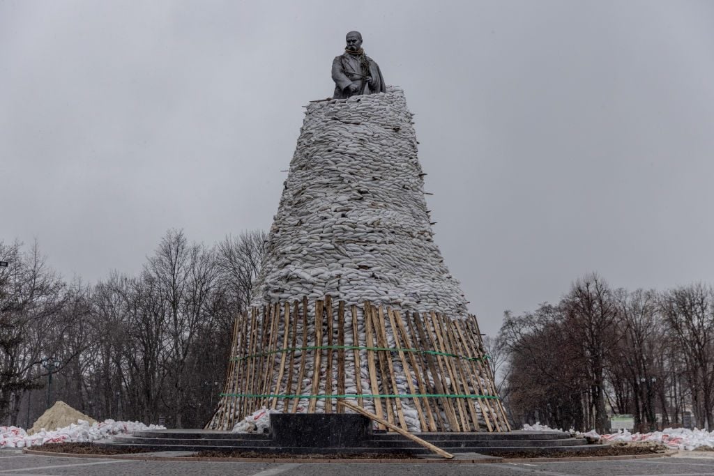 A statue of Ukrainian poet Taras Shevchenko is seen protected by sandbags on March 27, 2022 in Kharkiv, Ukraine. (Photo by Chris McGrath/Getty Images)