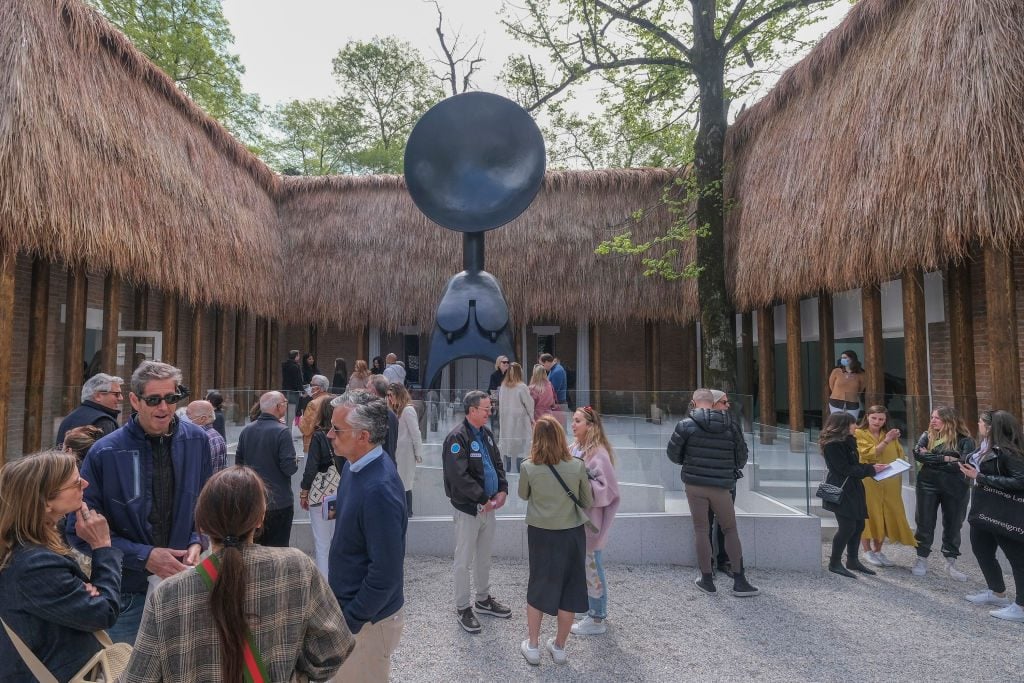 Tourists and locals wait to enter the U.S. Pavilion during the 59th International Art Exhibition (Biennale Arte) on April 20, 2022 in Venice, Italy. Photo: Stefano Mazzola/Getty Images.