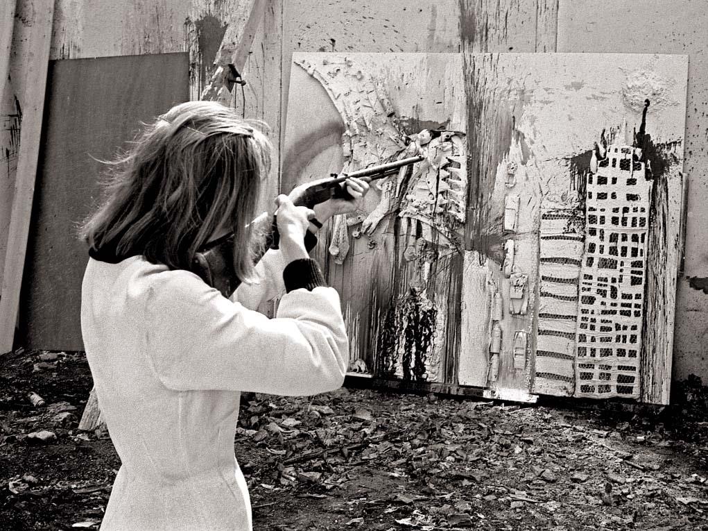 Niki de Saint Phalle during a shooting session at Impasse Ronsin, Paris, 1962. © André Morain.
