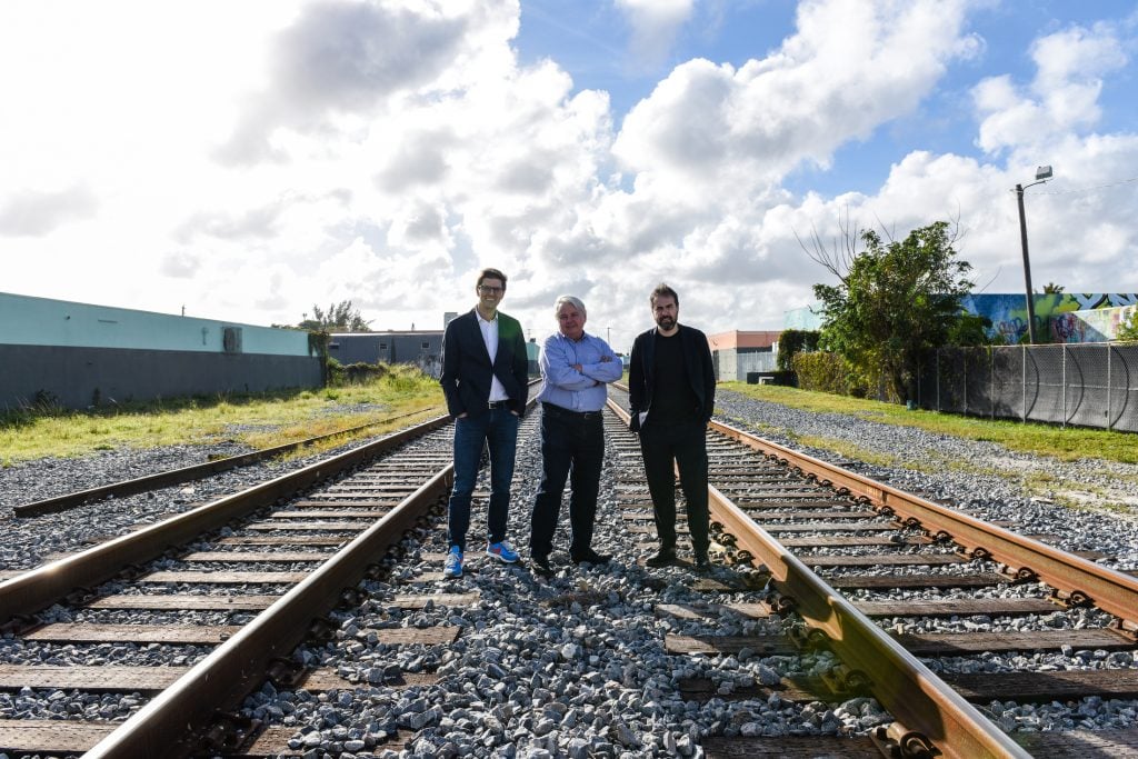 Oolite Arts President and CEO Dennis Scholl, center, with architects Alberto Veiga and Fabrizio Barozzi. Photo: Christina Mendenhall.
